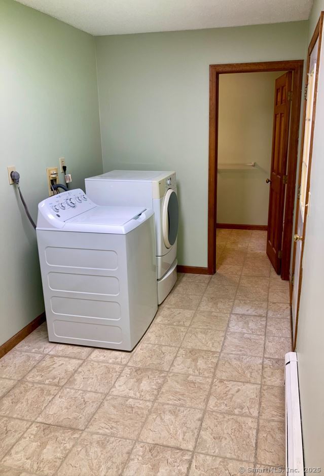 7 Morey Road New Milford, CT 06776 - Photo 13 of 25 a utility room with a wooden floor washer and dryer