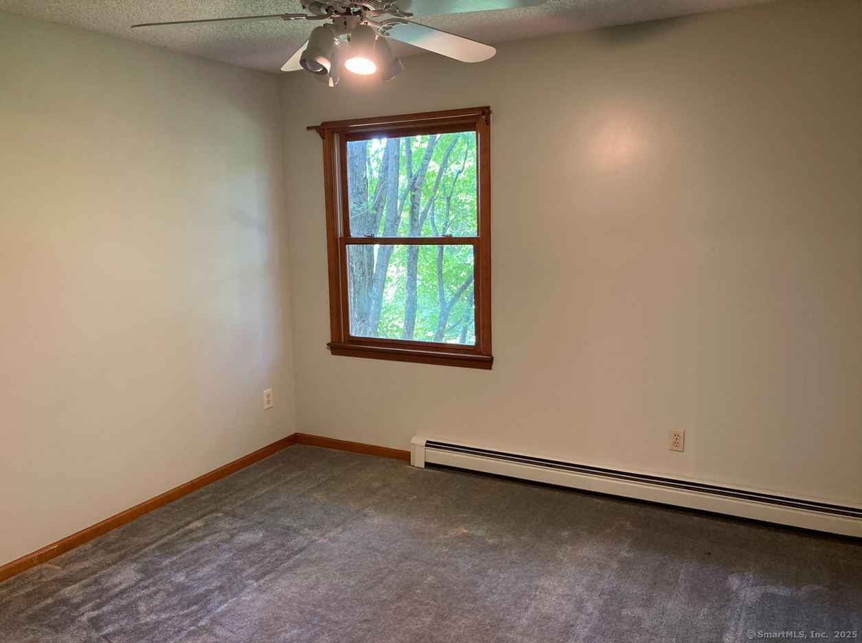 7 Morey Road New Milford, CT 06776 - Photo 15 of 25 an empty room with a window