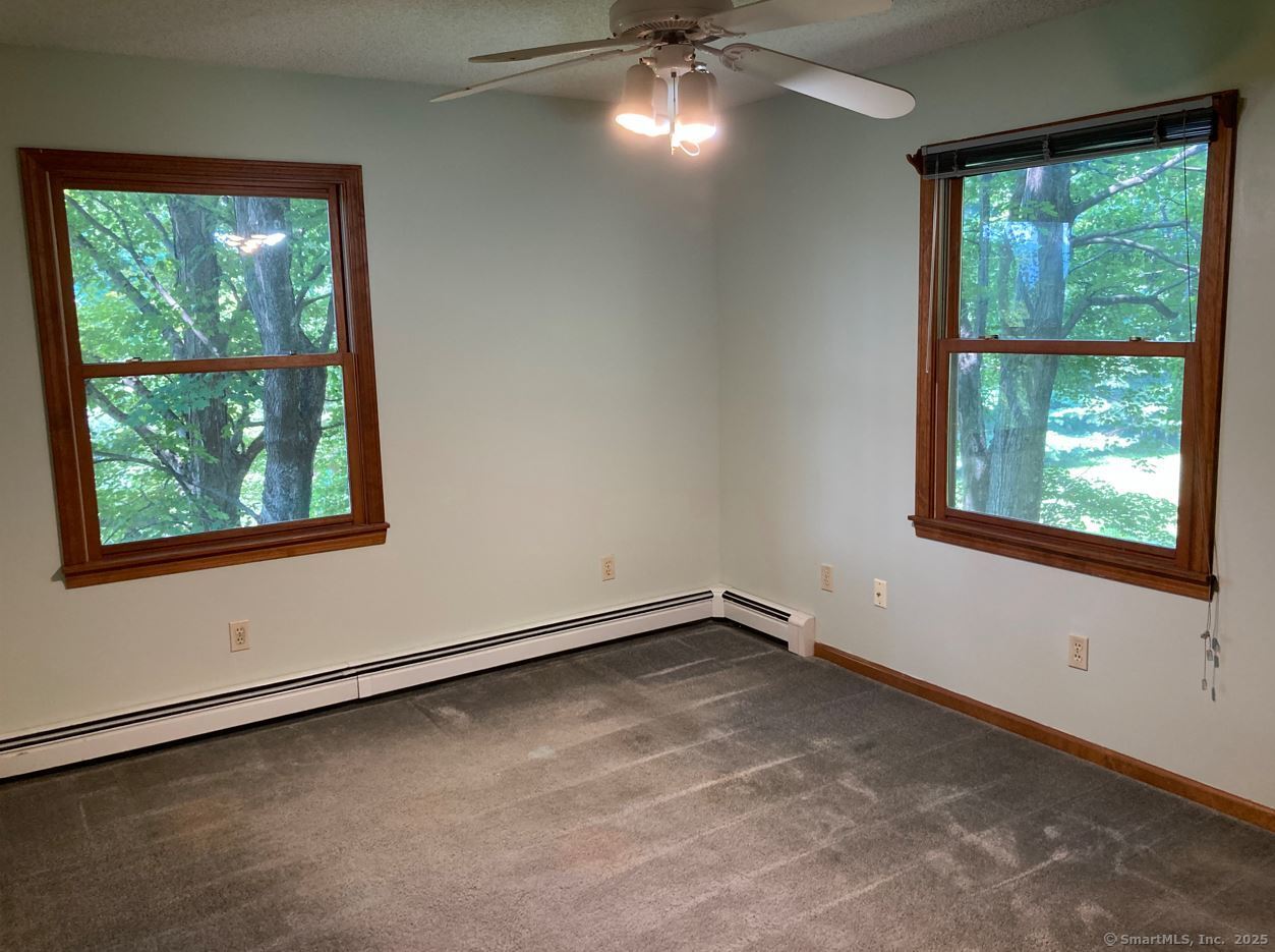 7 Morey Road New Milford, CT 06776 - Photo 17 of 25 an empty room with a window