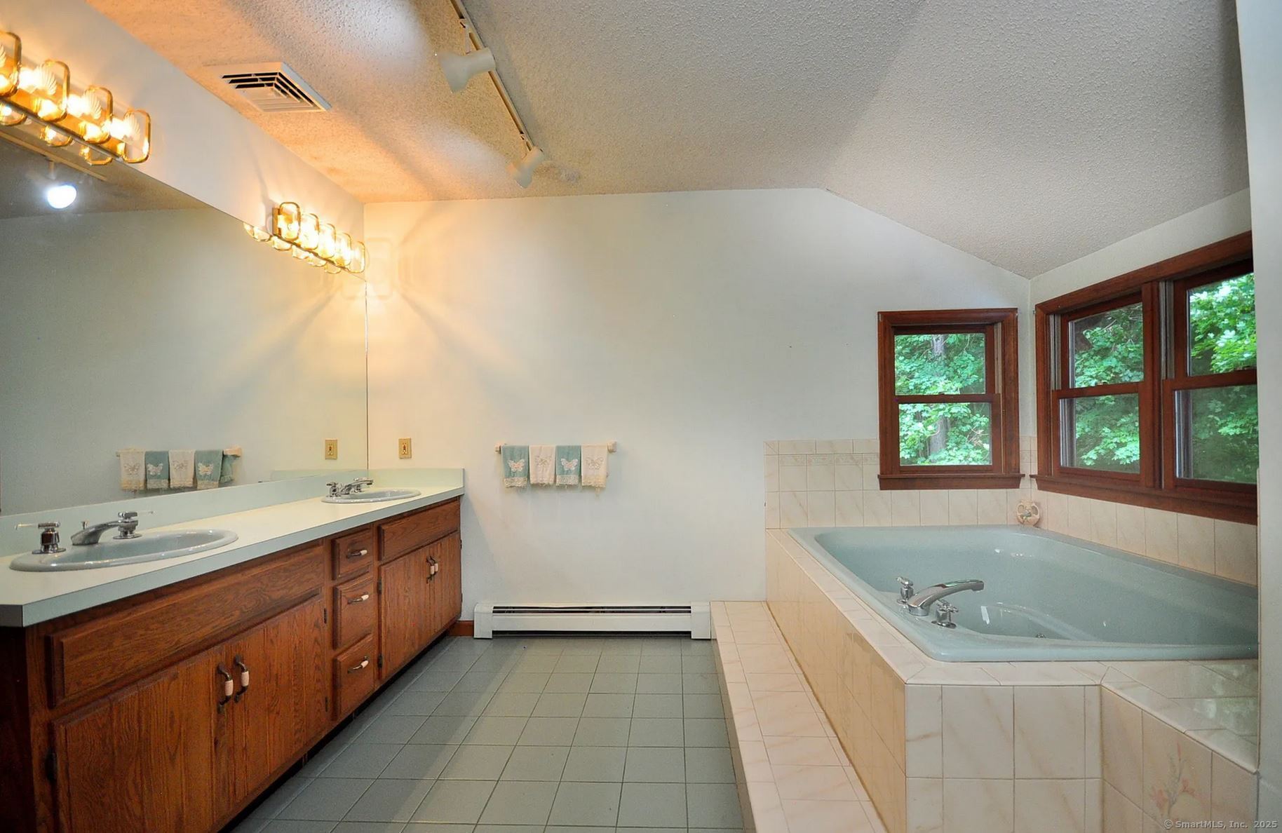 7 Morey Road New Milford, CT 06776 - Photo 21 of 25 a bathroom with a granite countertop sink and mirror with bathtub