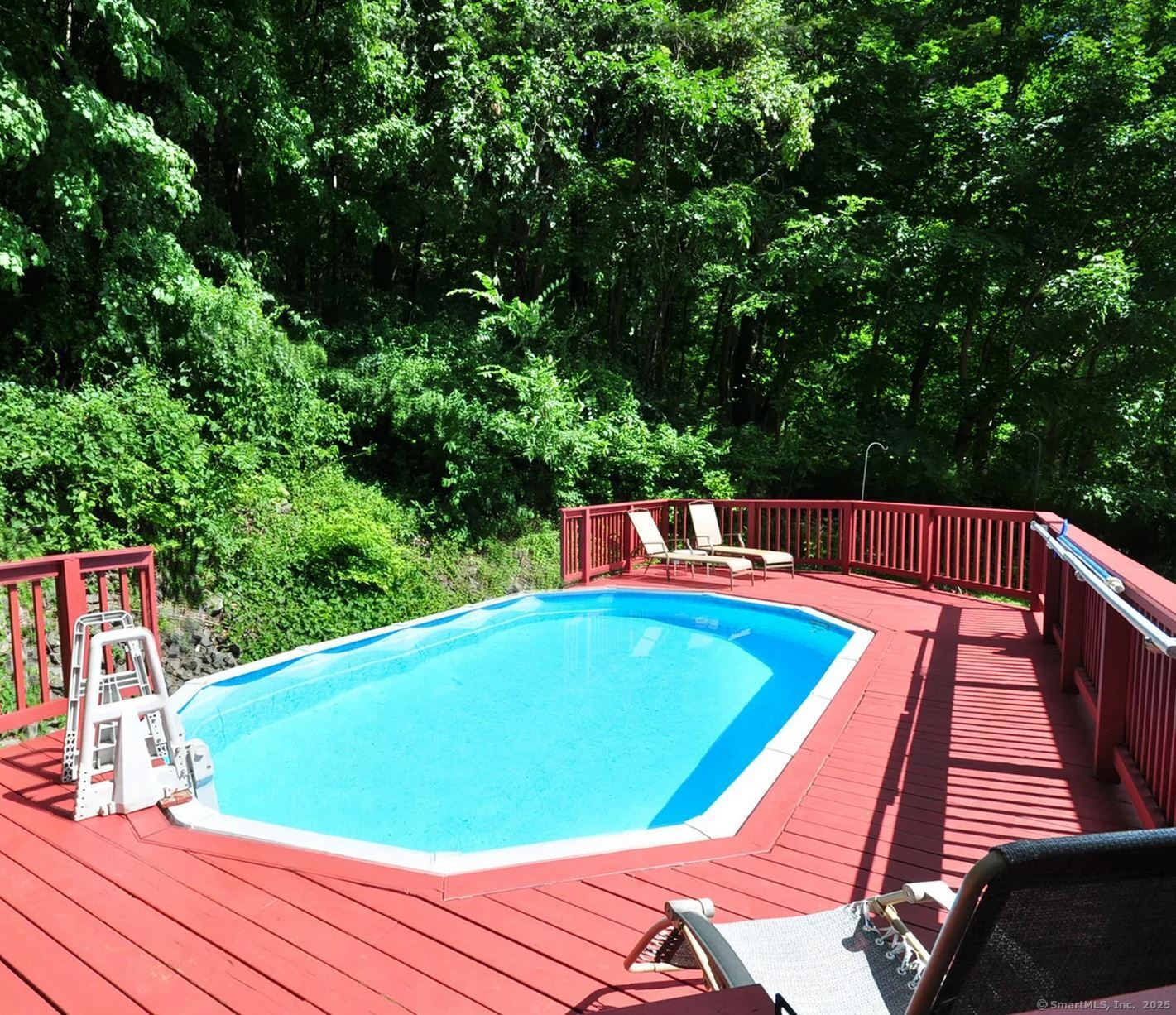 7 Morey Road New Milford, CT 06776 - Photo 22 of 25 a view of a swimming pool with a patio