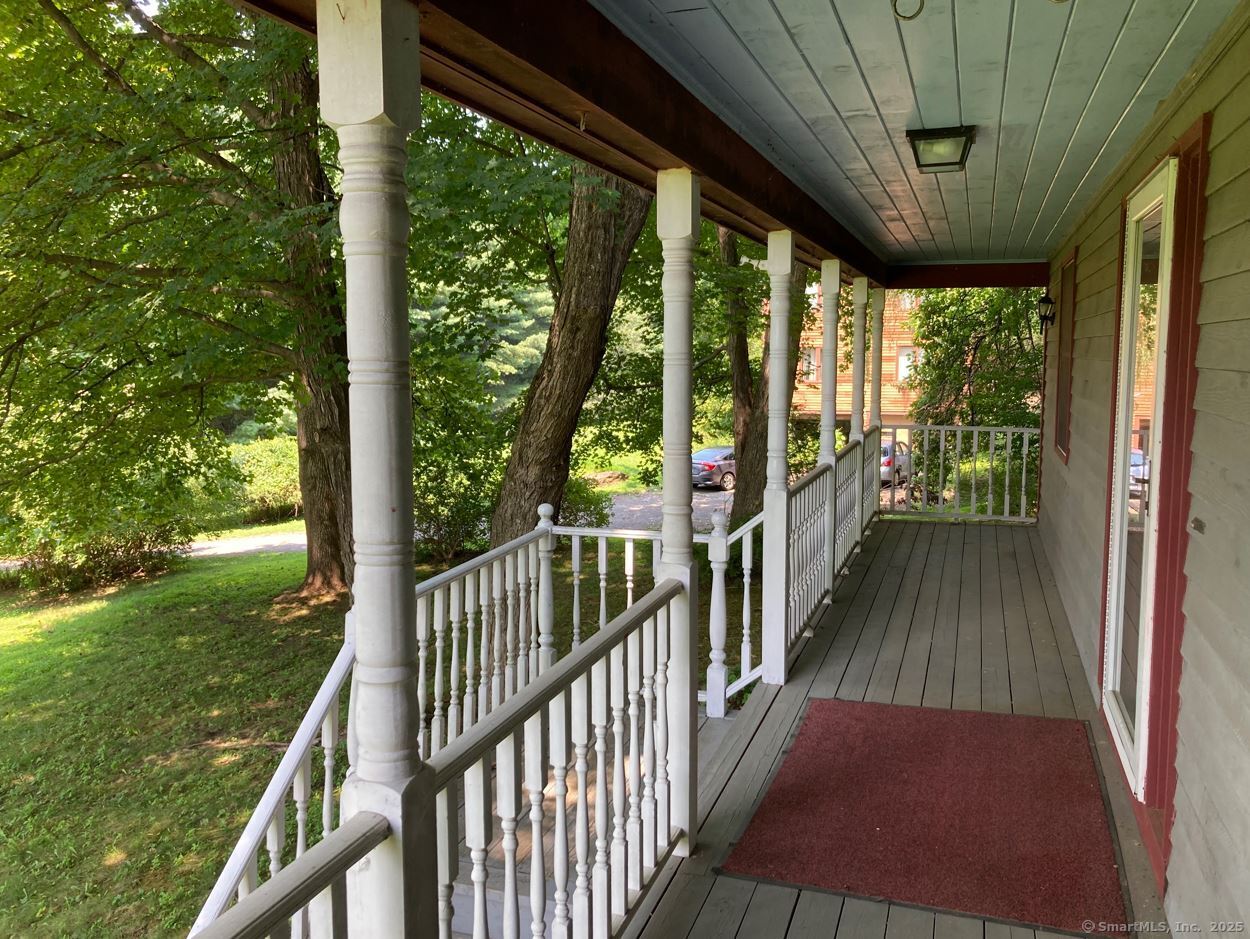 7 Morey Road New Milford, CT 06776 - Photo 4 of 25 a view of balcony with wooden floor
