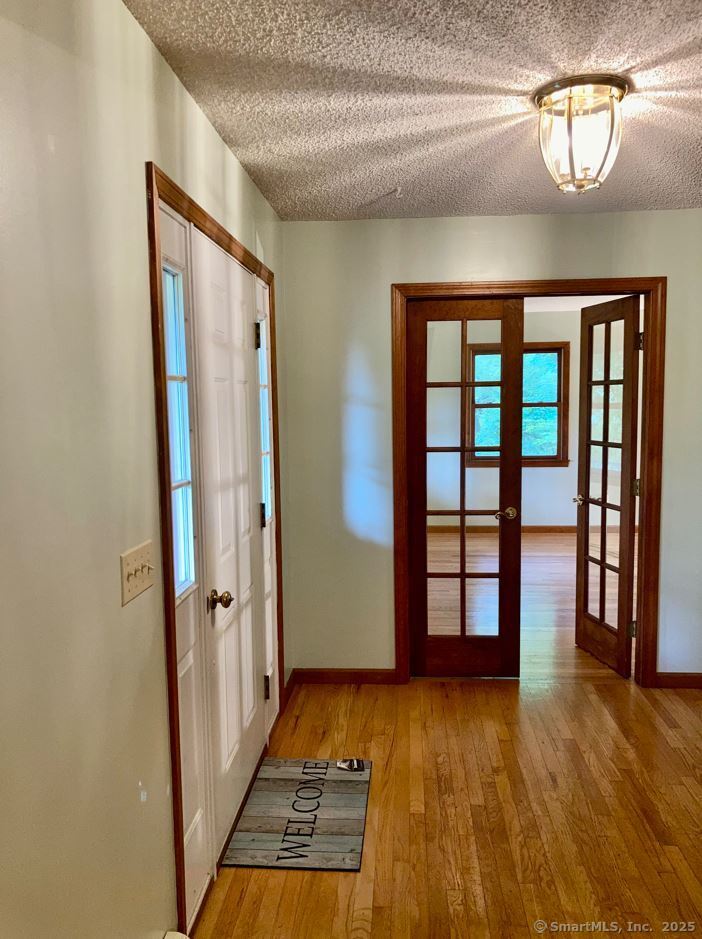 7 Morey Road New Milford, CT 06776 - Photo 5 of 25 wooden floor in an empty room and a window