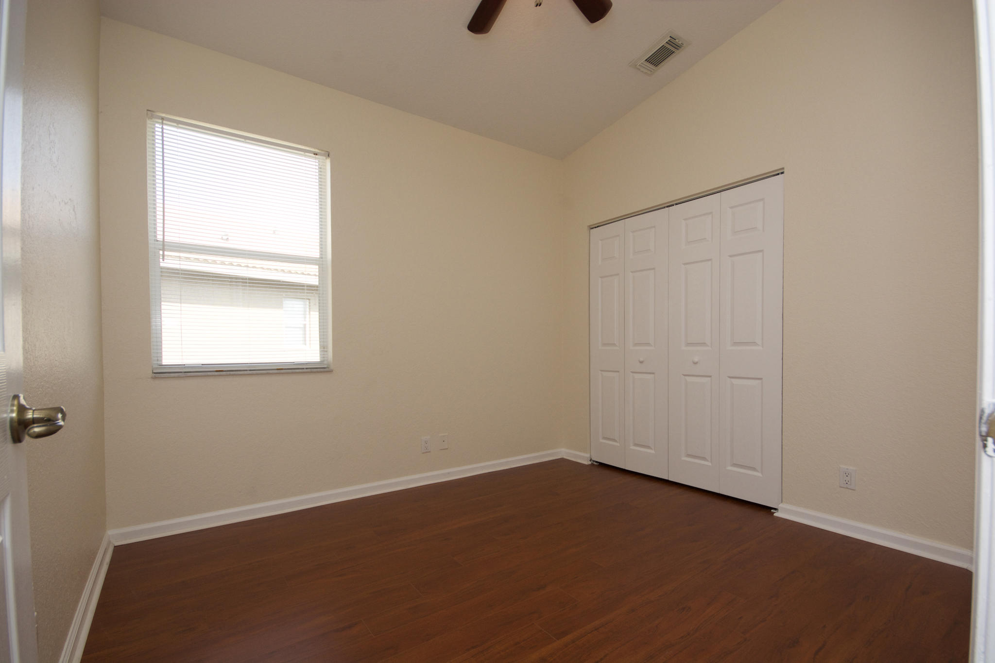 3227 Laurel Ridge Circle Riviera Beach, FL 33404 - Photo 18 of 27 an empty room with a window