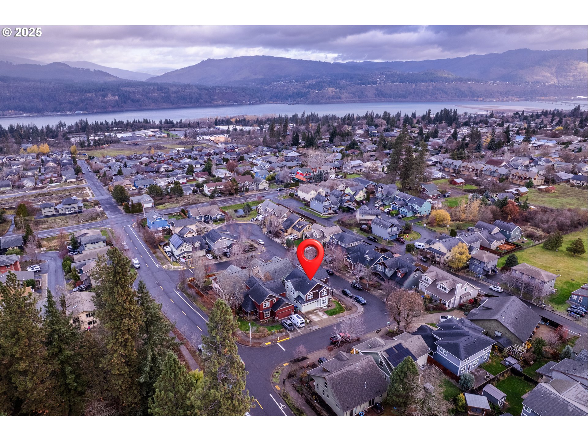 1110 Redtail Loop Hood River, OR 97031 - Photo 2 of 37 an aerial view of residential house and sandy dunes