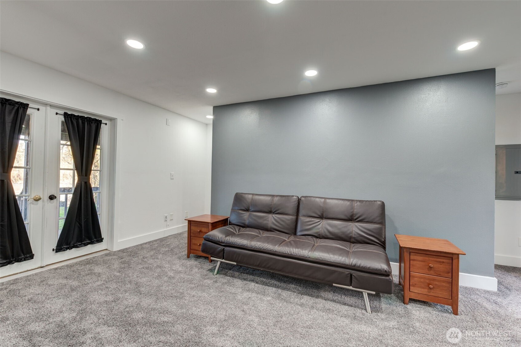 26015 166th Street Southeast, Unit B Monroe, WA 98272 - Photo 9 of 28 a living room with furniture and a window