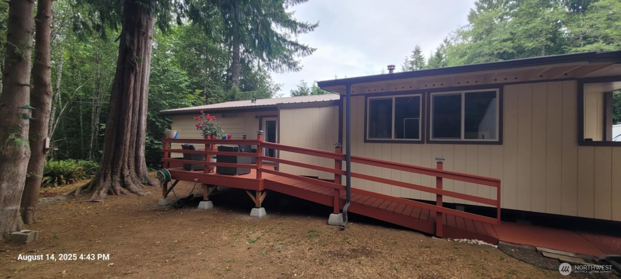 222 Delezenne Road Elma, WA 98541 - Photo 20 of 31 a view of a wooden bench in back yard of a house
