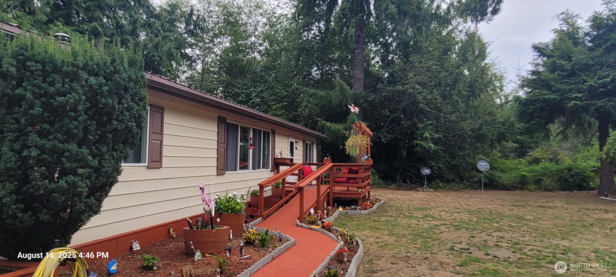 222 Delezenne Road Elma, WA 98541 - Photo 2 of 31 a view of backyard with deck and outdoor seating