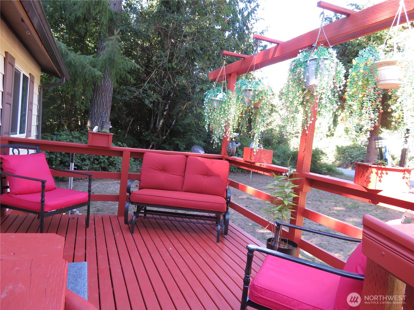 222 Delezenne Road Elma, WA 98541 - Photo 4 of 31 a outdoor sitting area with furniture and wooden floor