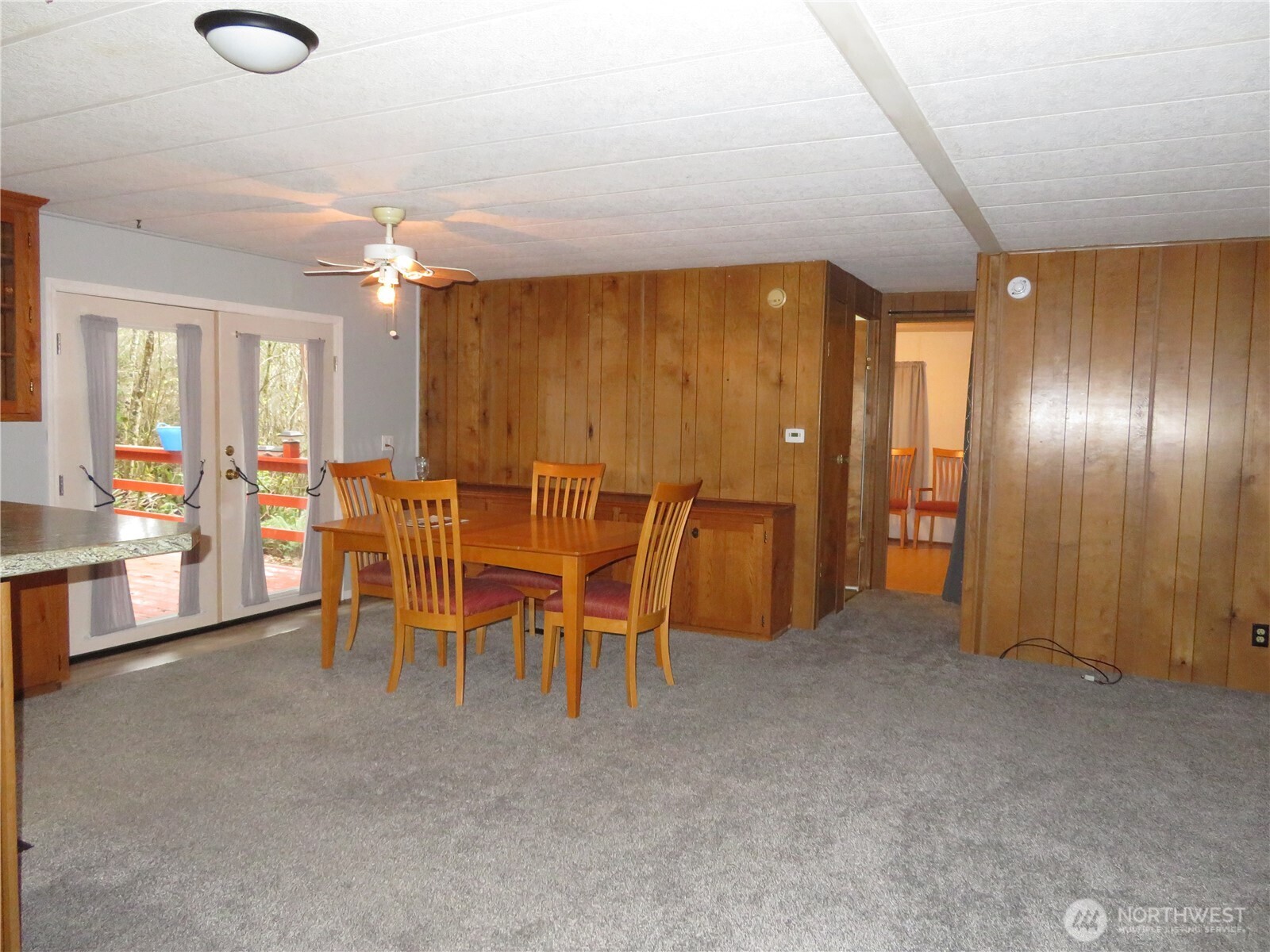 222 Delezenne Road Elma, WA 98541 - Photo 7 of 31 a dining room with furniture and chandelier