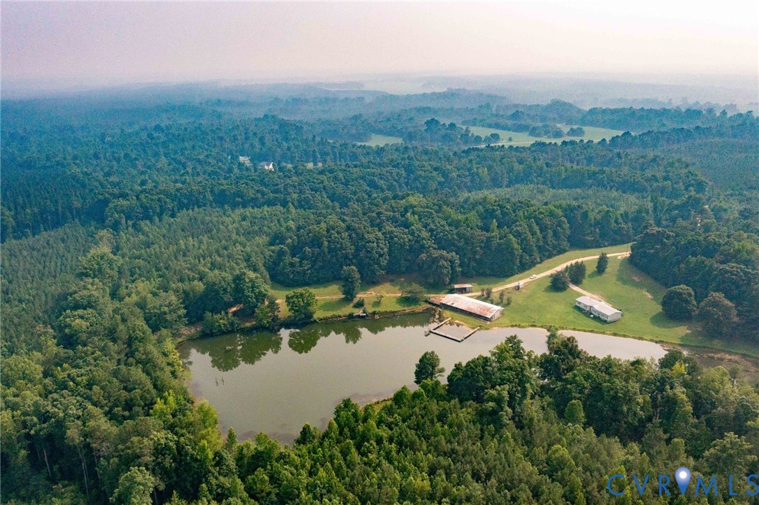 13127 Continental Road Ford, VA 23850 - Photo 8 of 17 Aerial overview revealing a private pond with two