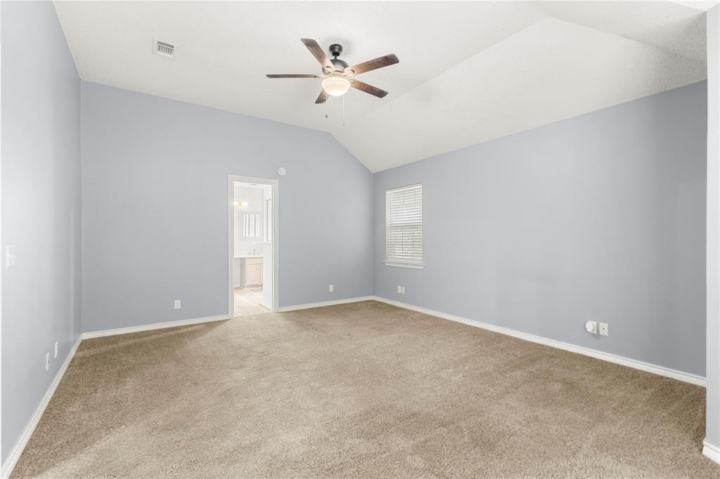 2917 Harlow Road Commerce, TX 75428 - Photo 18 of 40 a view of an empty room with a window