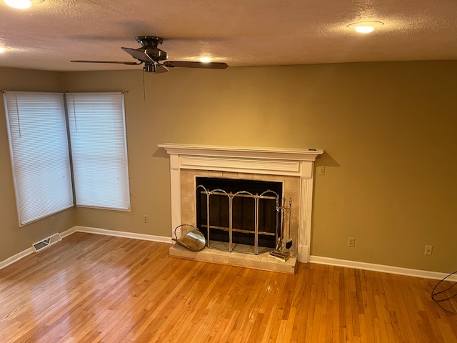 1210 Sunset Terrace Rochelle, IL 61068 - Photo 5 of 38 a view of an empty room with a fireplace and a window