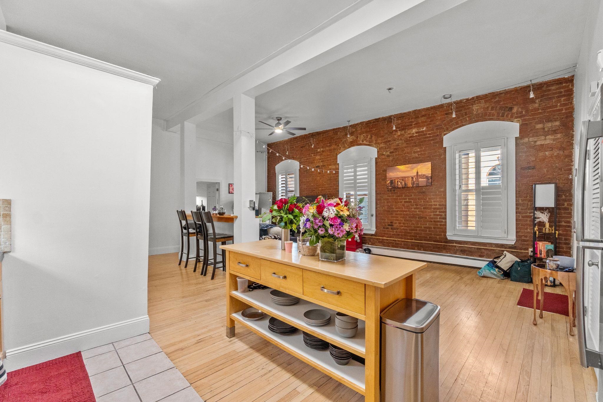 76 Jackson Street, Unit 4R Hoboken, NJ 07030 - Photo 10 of 17 a view of living room and dining room