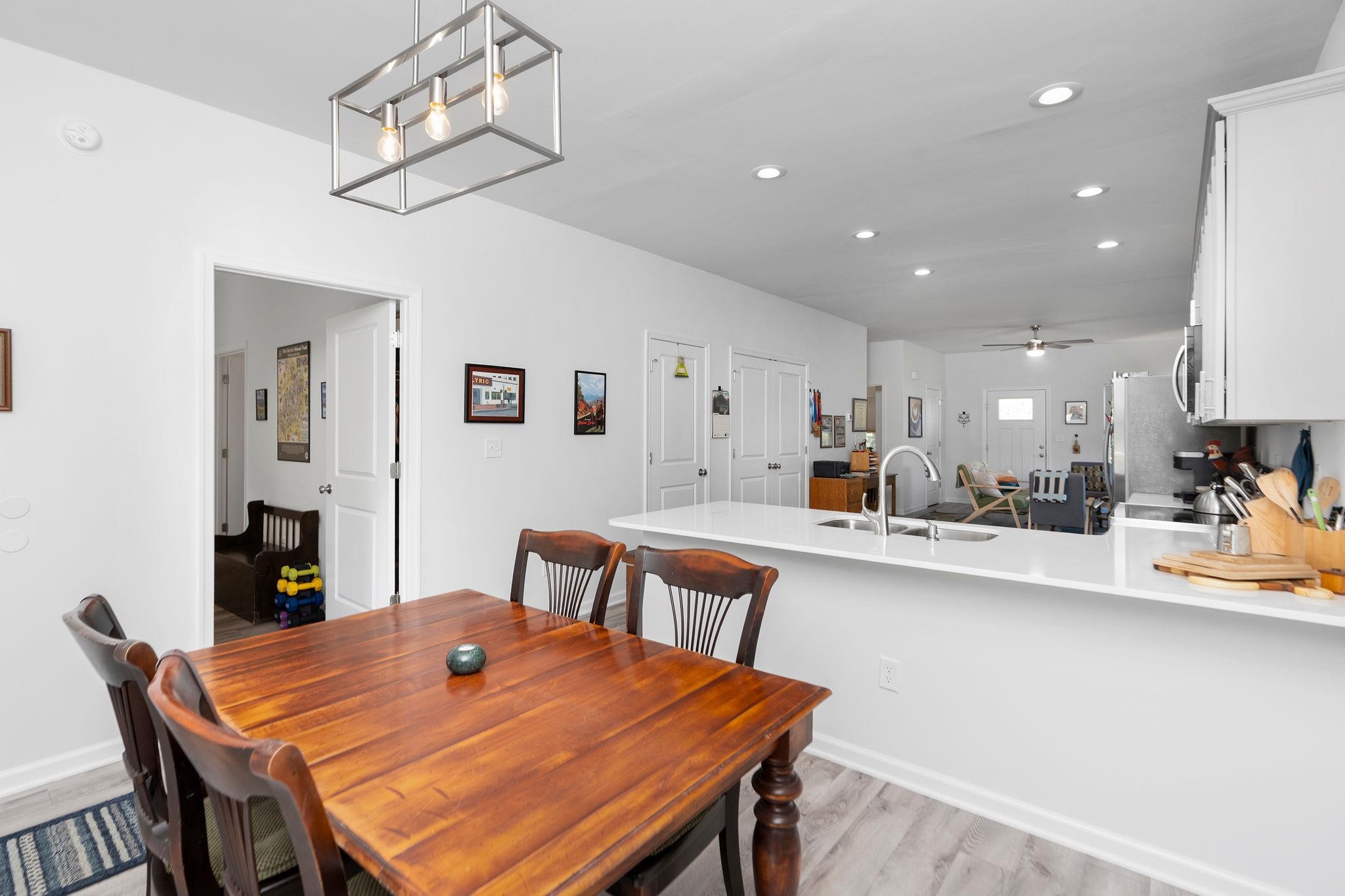 138 Garber Street Staunton, VA 24401 - Photo 20 of 47 a dining room with a table chairs and kitchen view