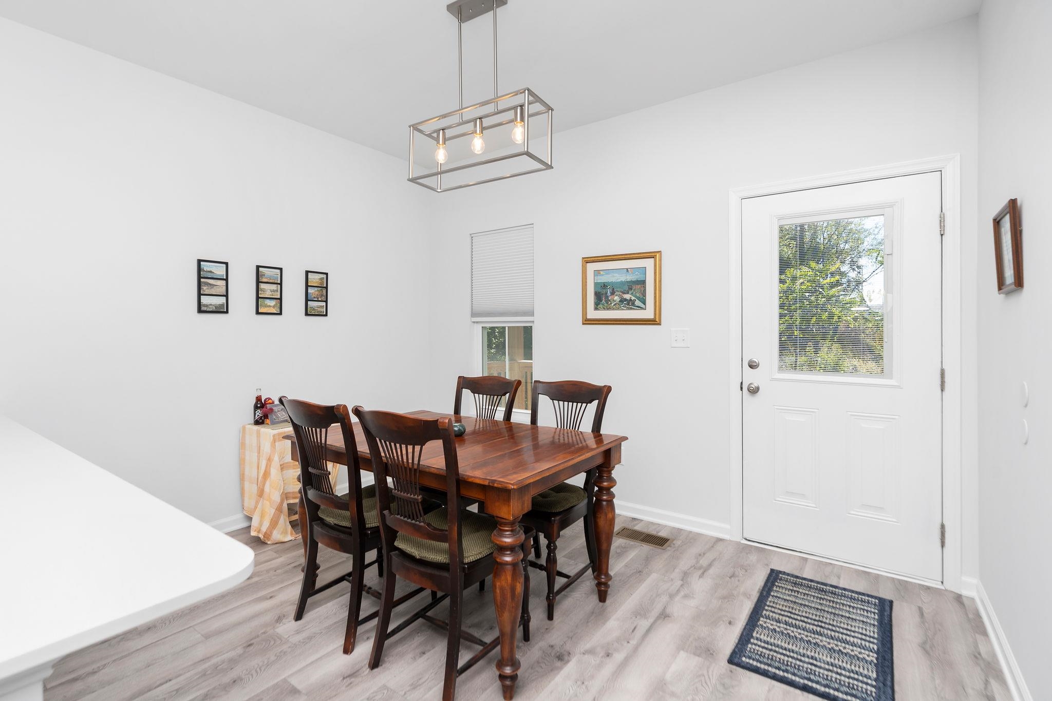 138 Garber Street Staunton, VA 24401 - Photo 21 of 47 a view of a dining room with furniture and wooden floor