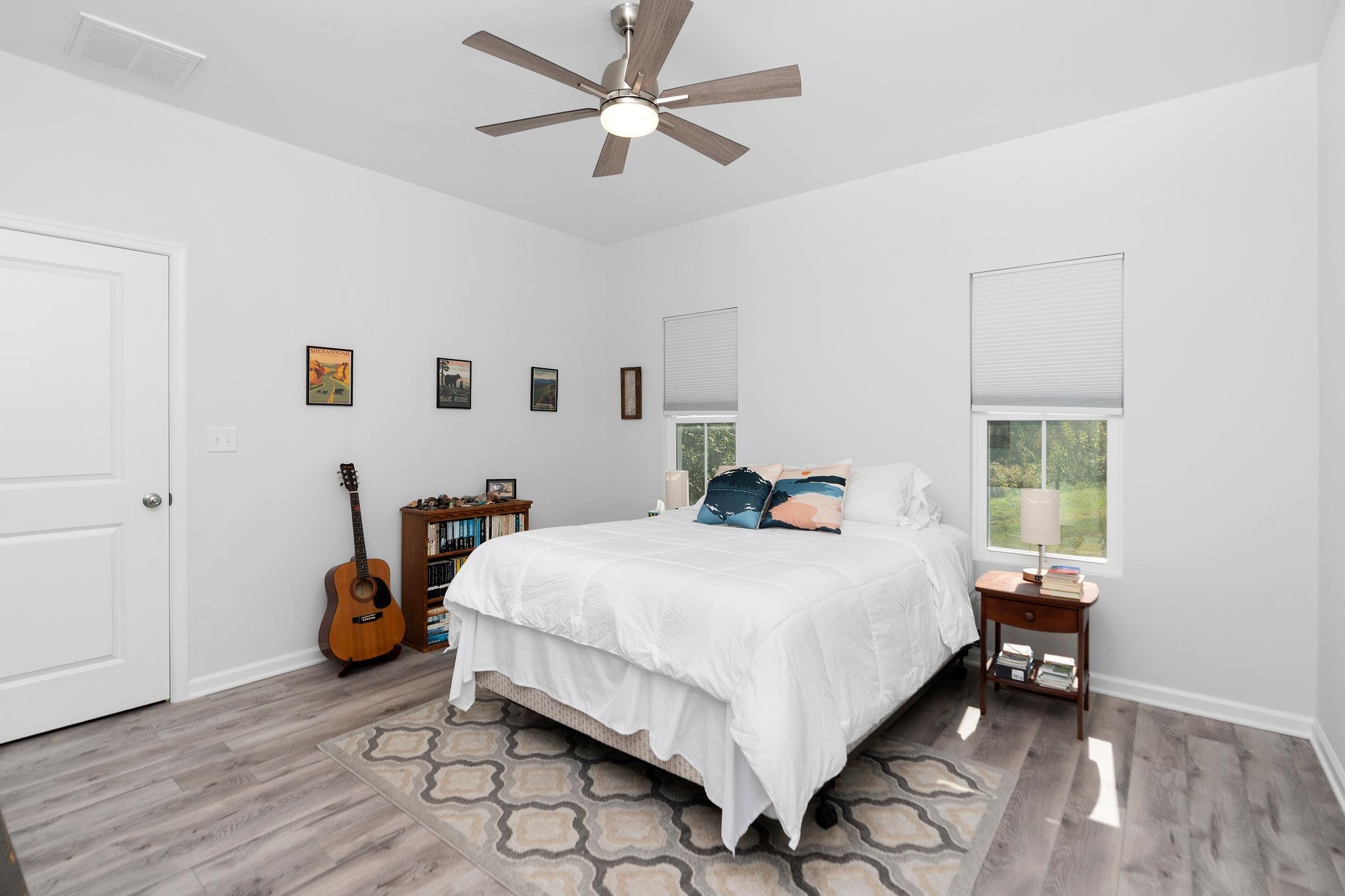 138 Garber Street Staunton, VA 24401 - Photo 25 of 47 a bedroom with a bed and wooden floor