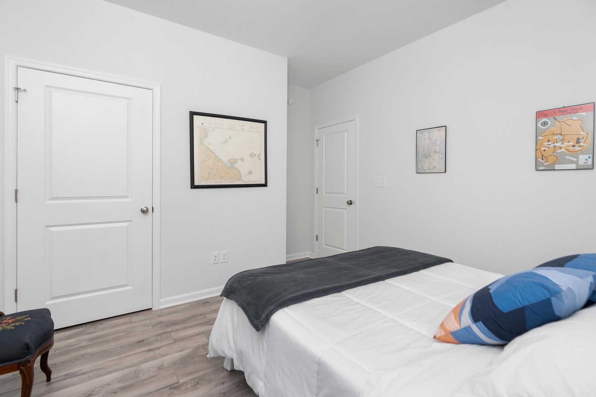 138 Garber Street Staunton, VA 24401 - Photo 26 of 47 a bedroom with a bed and a painting on the wall