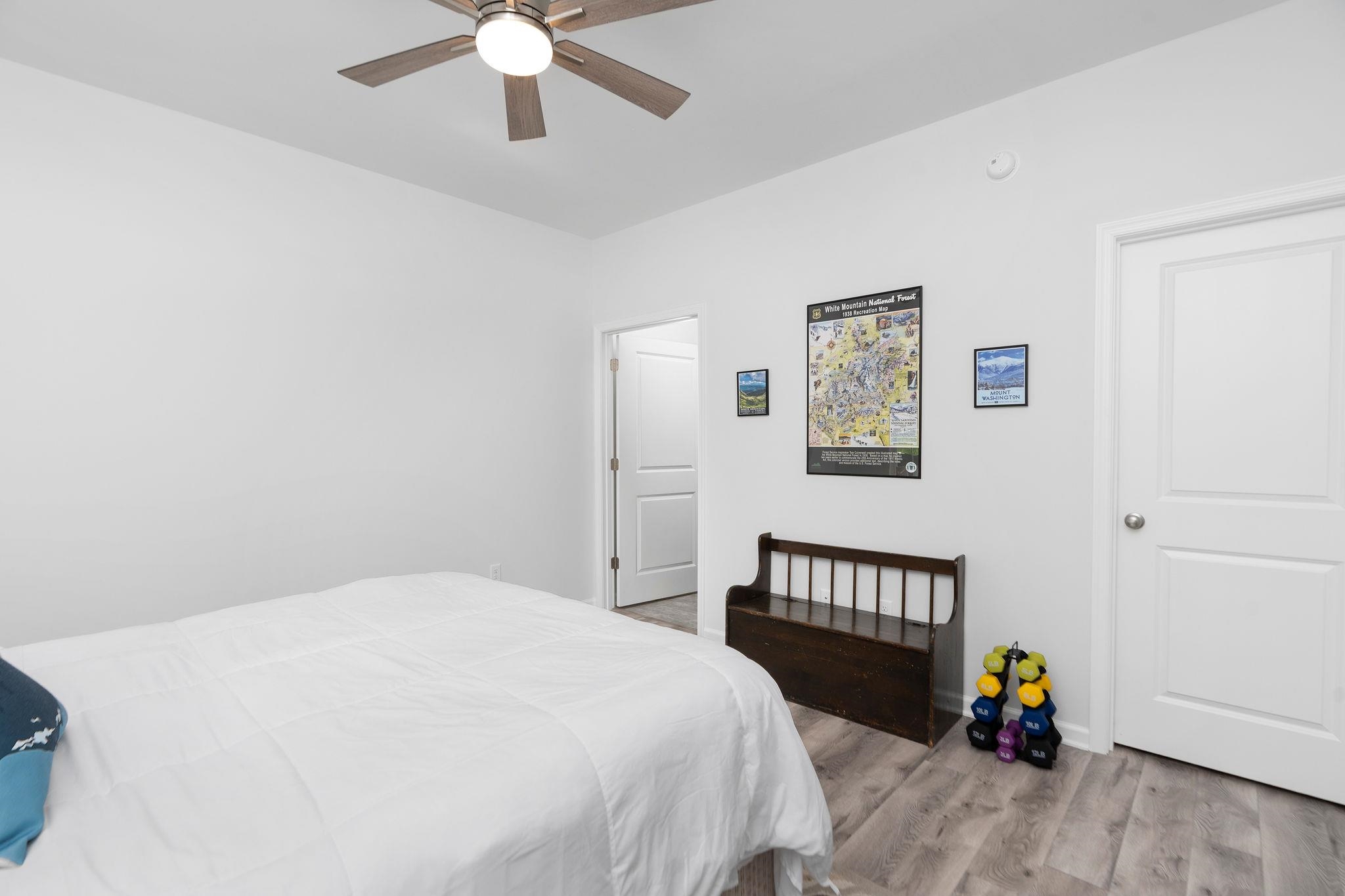 138 Garber Street Staunton, VA 24401 - Photo 27 of 47 a bedroom with a bed and a chandelier