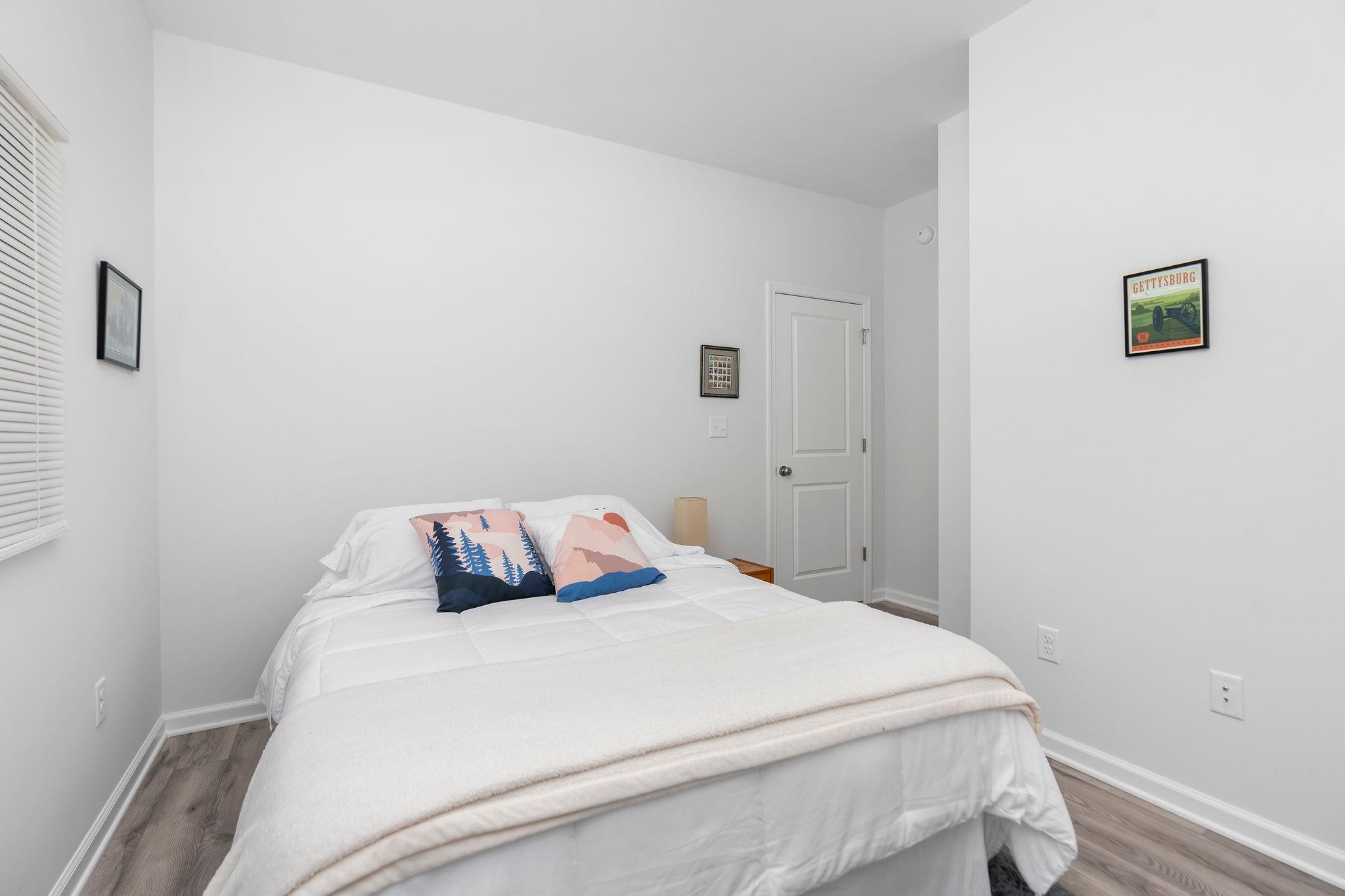 138 Garber Street Staunton, VA 24401 - Photo 28 of 47 a bedroom with a bed and a window