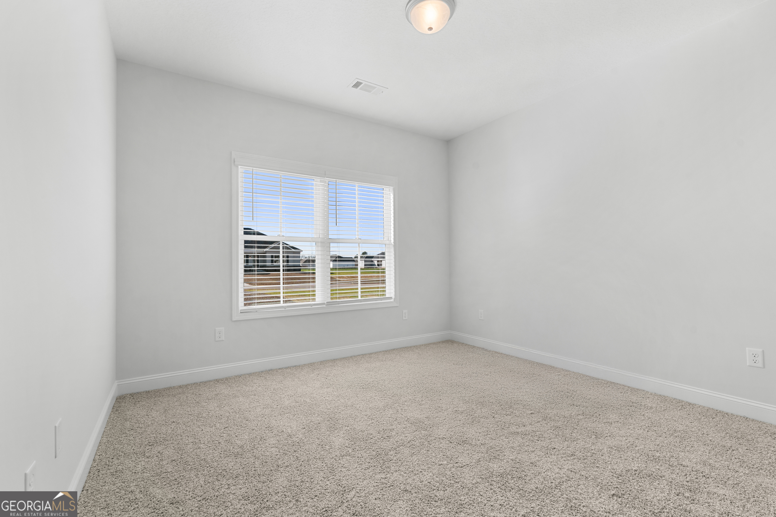 209 Hopecrest Road Statesboro, GA 30458 - Photo 17 of 27 an empty room with a window