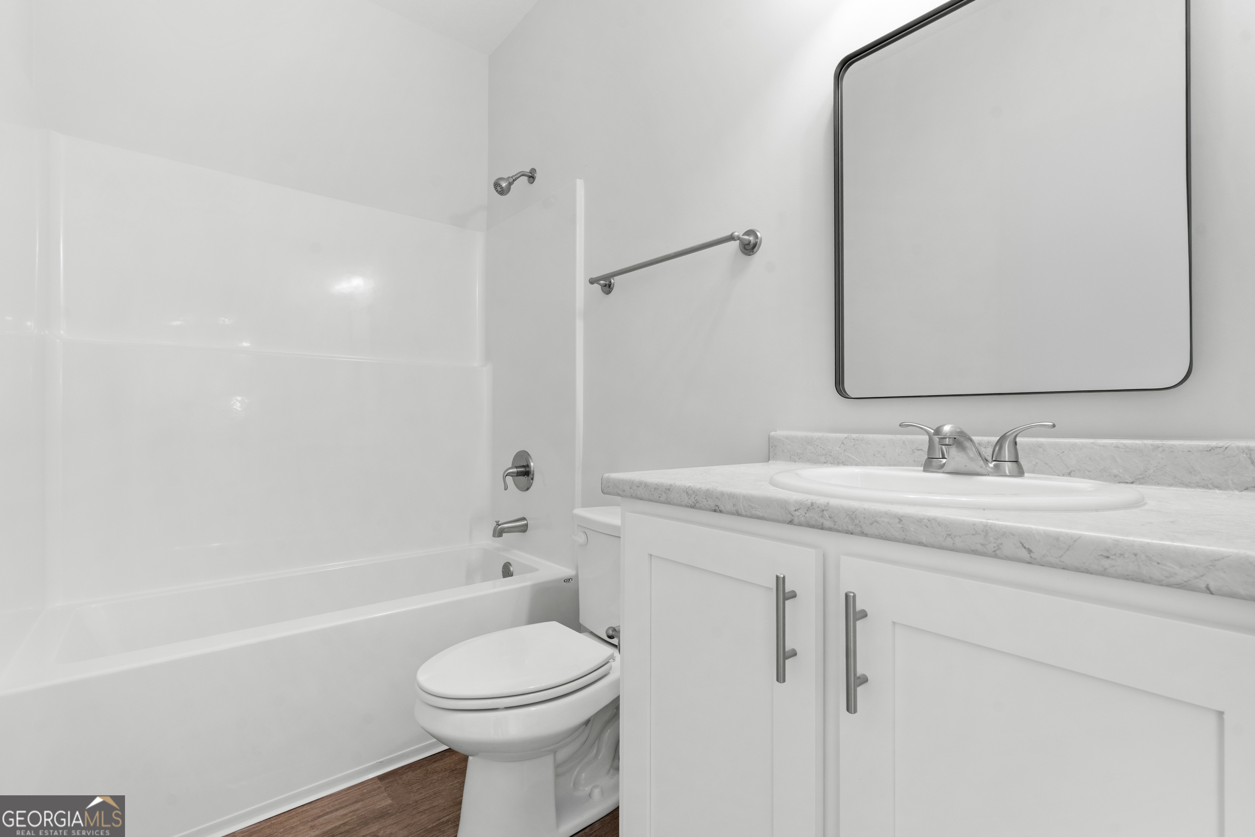 209 Hopecrest Road Statesboro, GA 30458 - Photo 20 of 27 a bathroom with a granite countertop sink toilet and shower