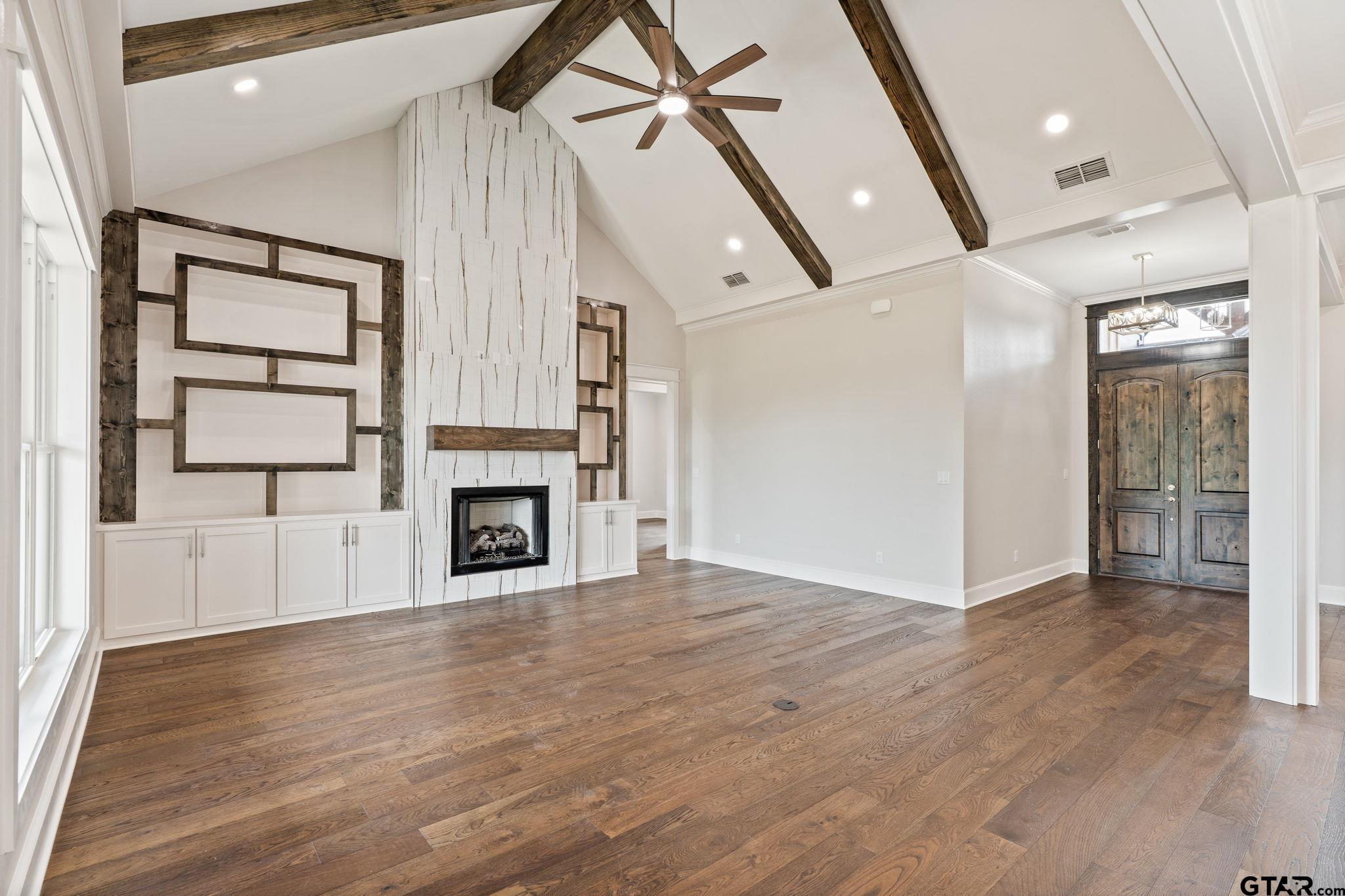 21064 Woodring Road Bullard, TX 75757 - Photo 28 of 48 a view of a livingroom with a fireplace and window