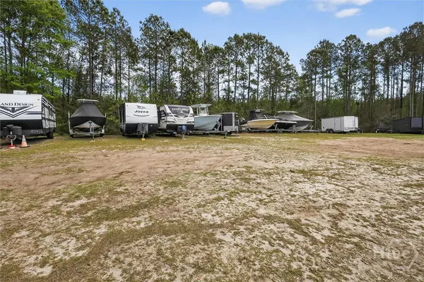 $470,000 | 289 Logging Hill Drive, Richmond Hill, GA 31324