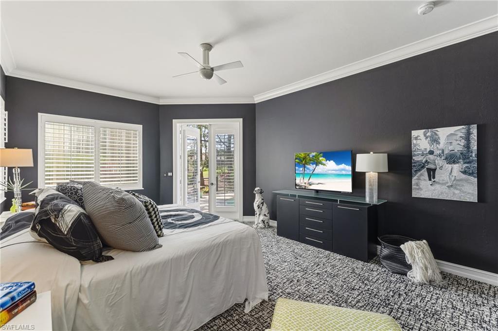 19979 Markward Crossing Estero, FL 33928 - Photo 17 of 36 a bedroom with a bed furniture and windows