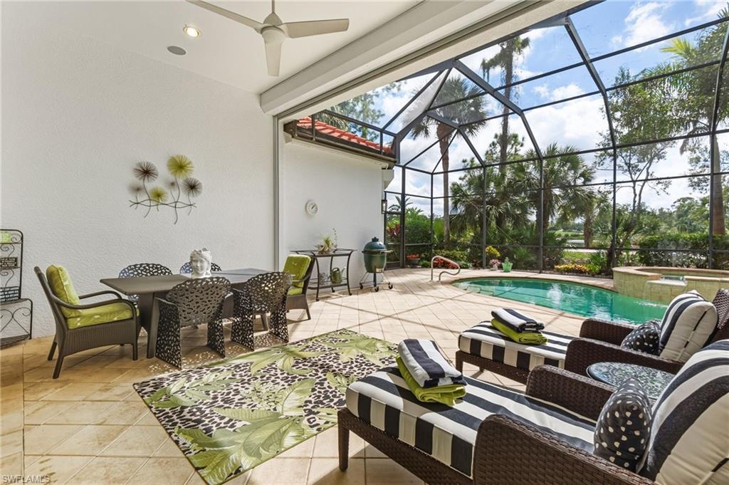 19979 Markward Crossing Estero, FL 33928 - Photo 28 of 36 a view of a patio with couches table and chairs