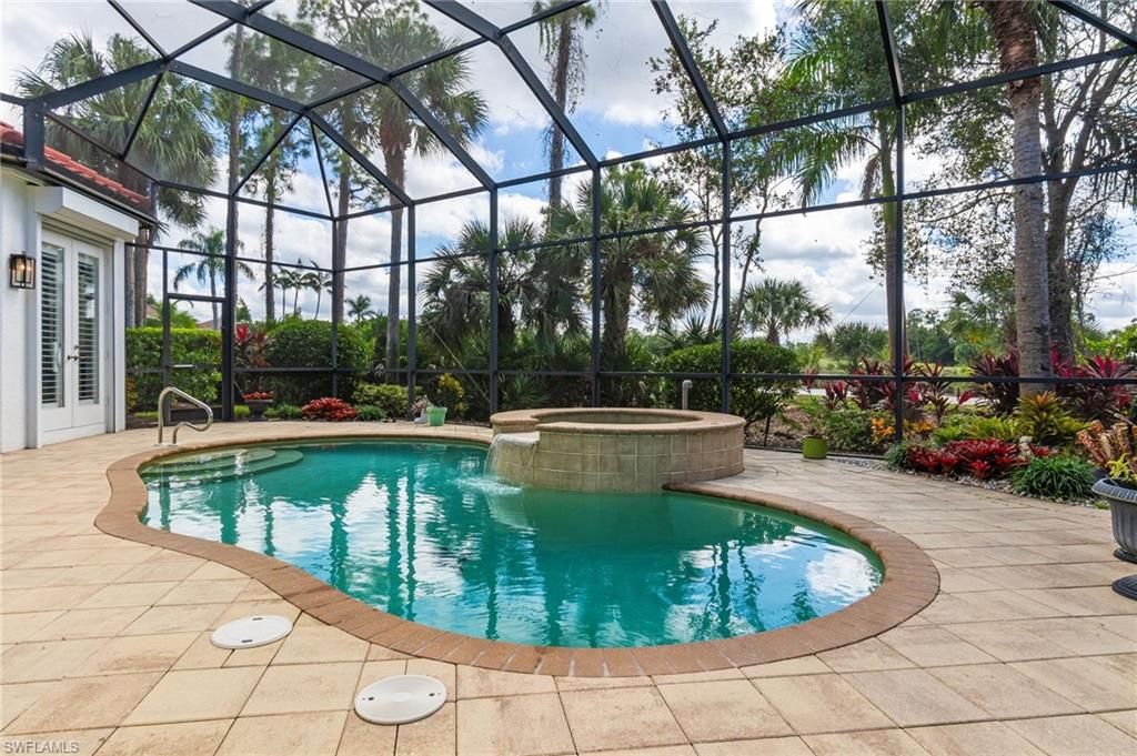 19979 Markward Crossing Estero, FL 33928 - Photo 28 of 35 a view of a swimming pool with a patio