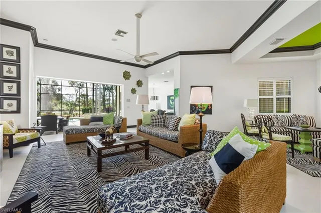 a living room with furniture or couch and a window