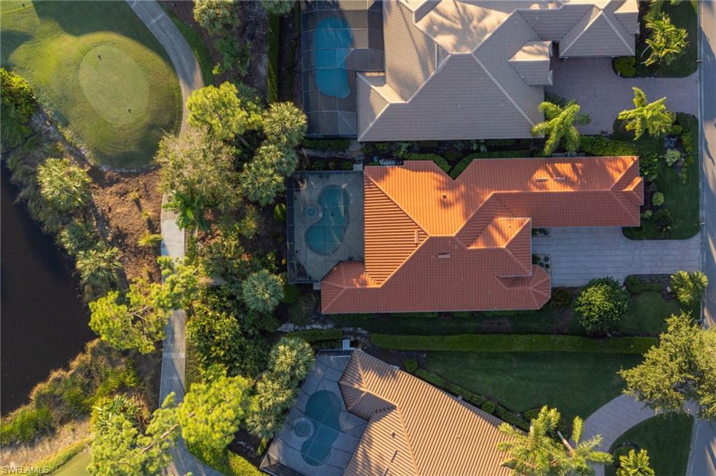 19979 Markward Crossing Estero, FL 33928 - Photo 30 of 35 an aerial view of a house with a yard and a large pool