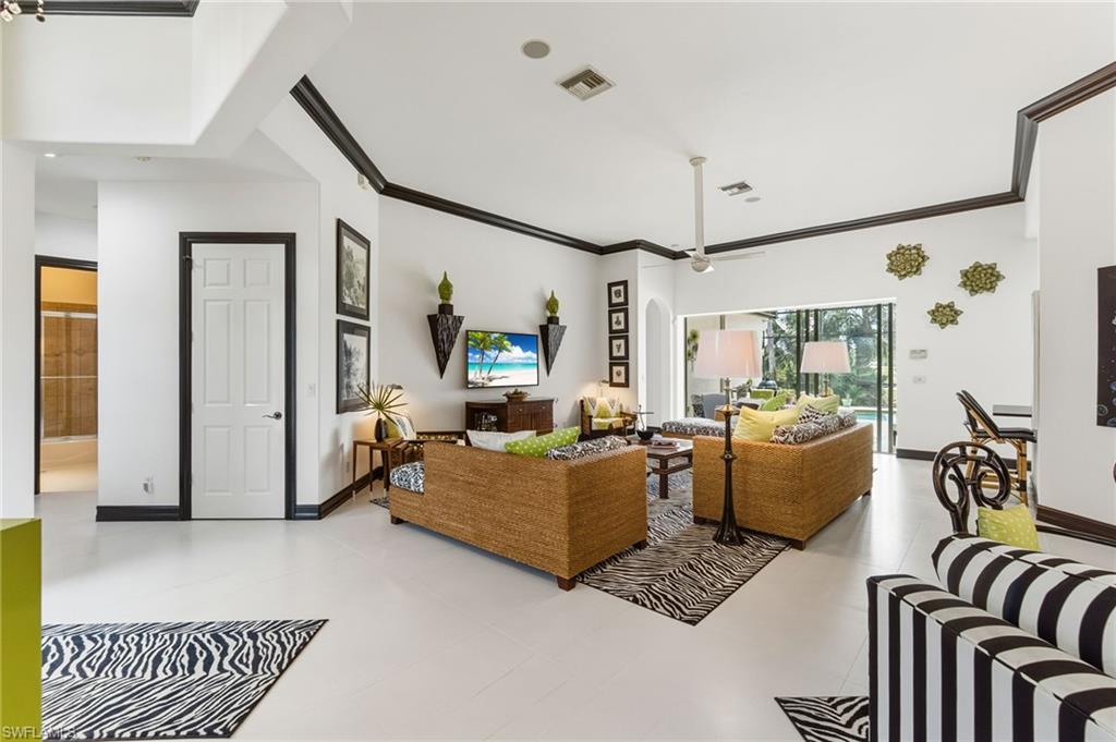 19979 Markward Crossing Estero, FL 33928 - Photo 8 of 36 a living room with furniture and a window