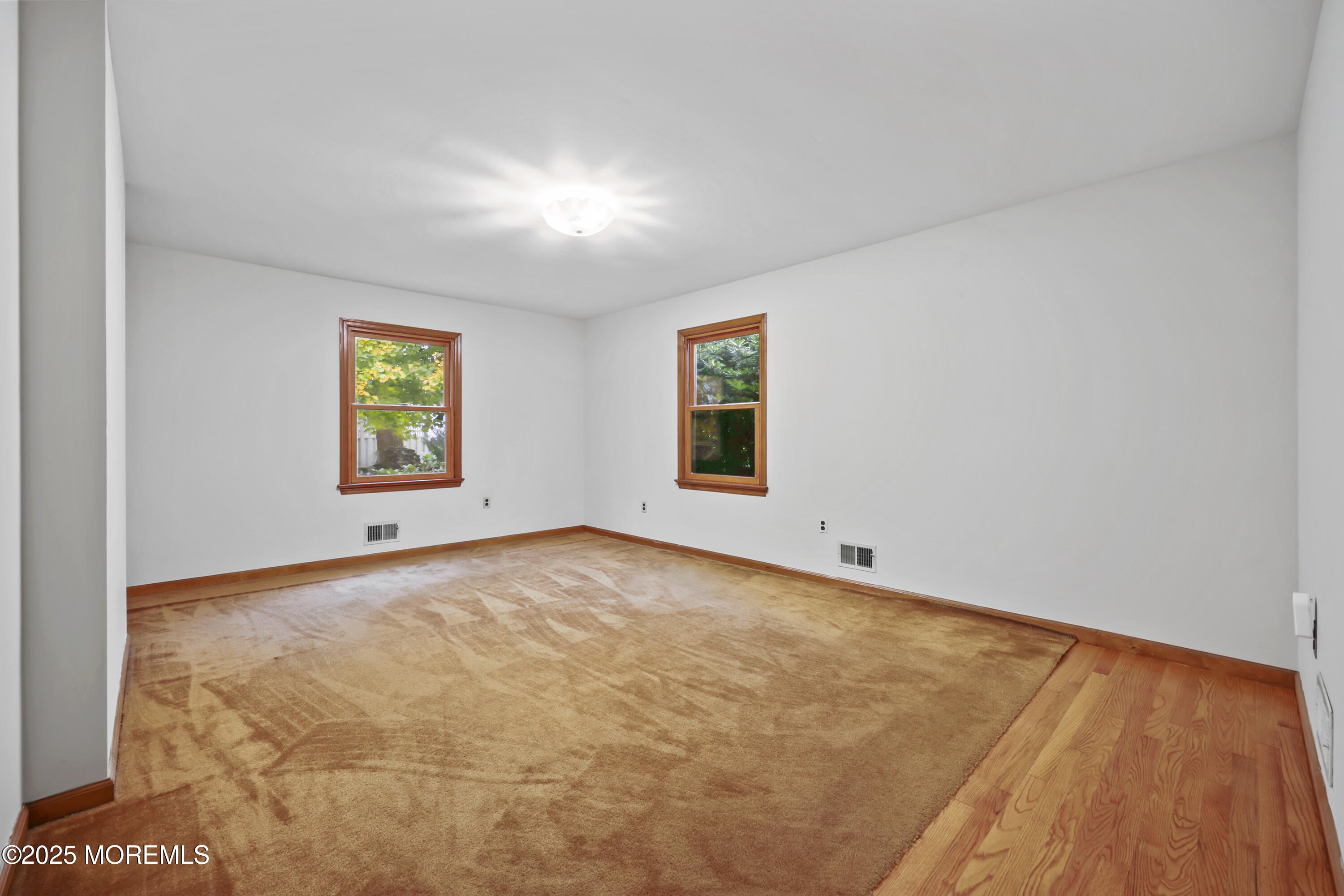 26 Edgewater Drive Matawan, NJ 07747 - Photo 13 of 23 an empty room with windows
