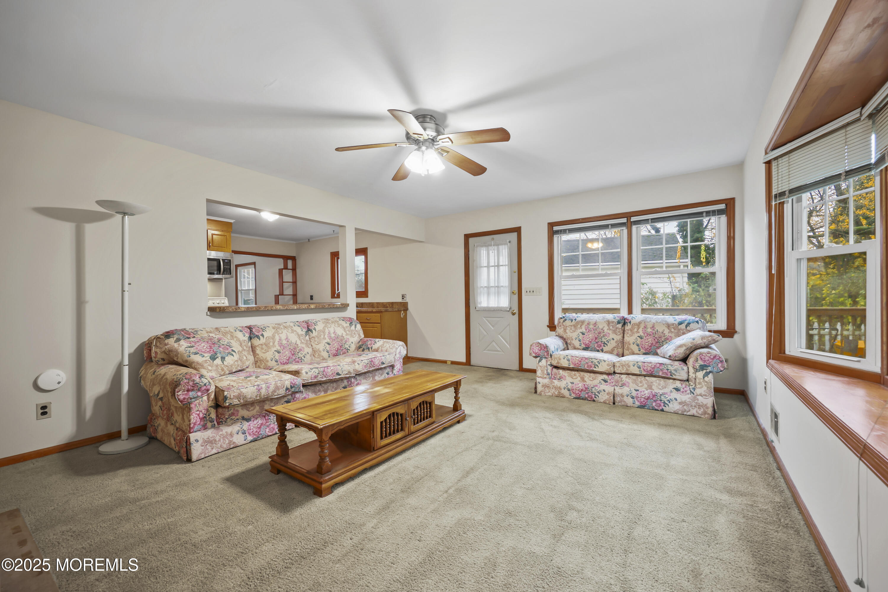 26 Edgewater Drive Matawan, NJ 07747 - Photo 19 of 23 a living room with furniture and a large window