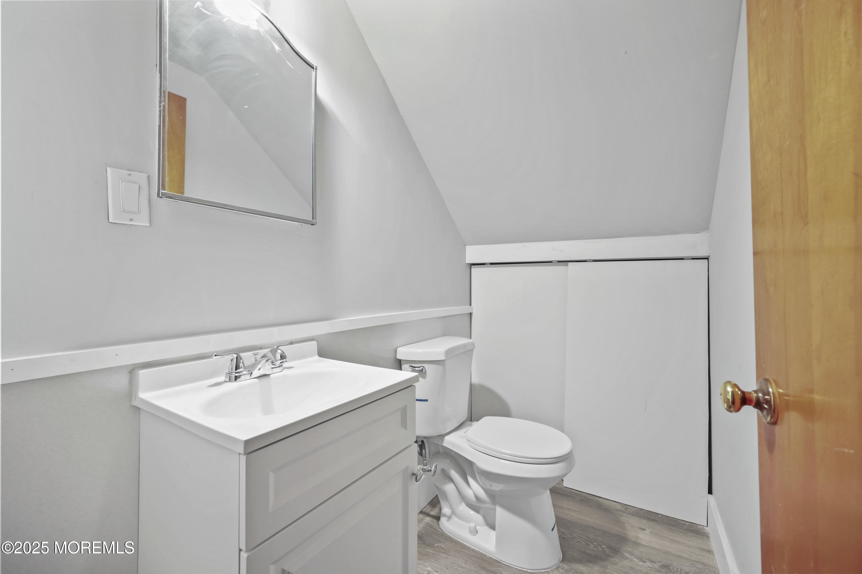 26 Edgewater Drive Matawan, NJ 07747 - Photo 20 of 23 a bathroom with a sink toilet and shower