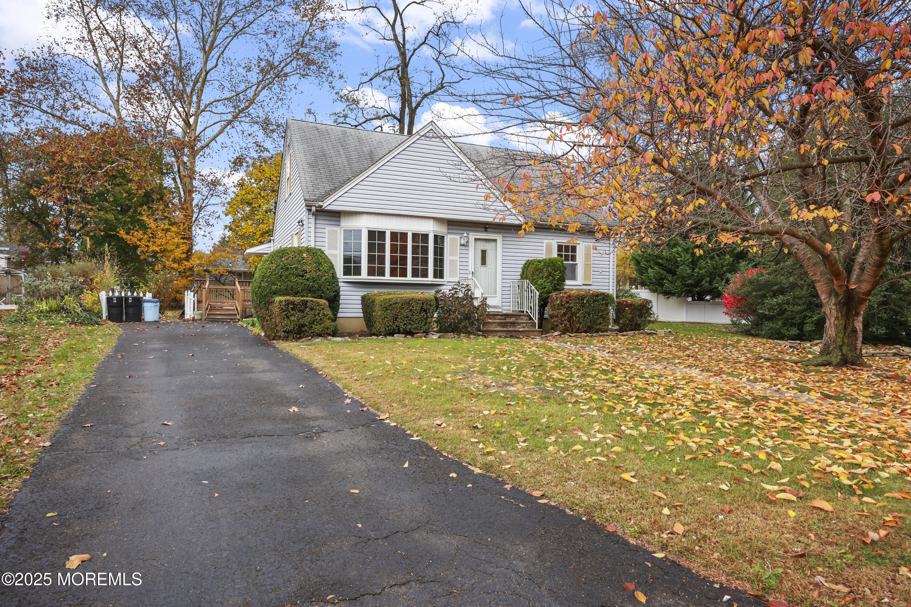 26 Edgewater Drive Matawan, NJ 07747 - Photo 2 of 23 a front view of a house with a yard