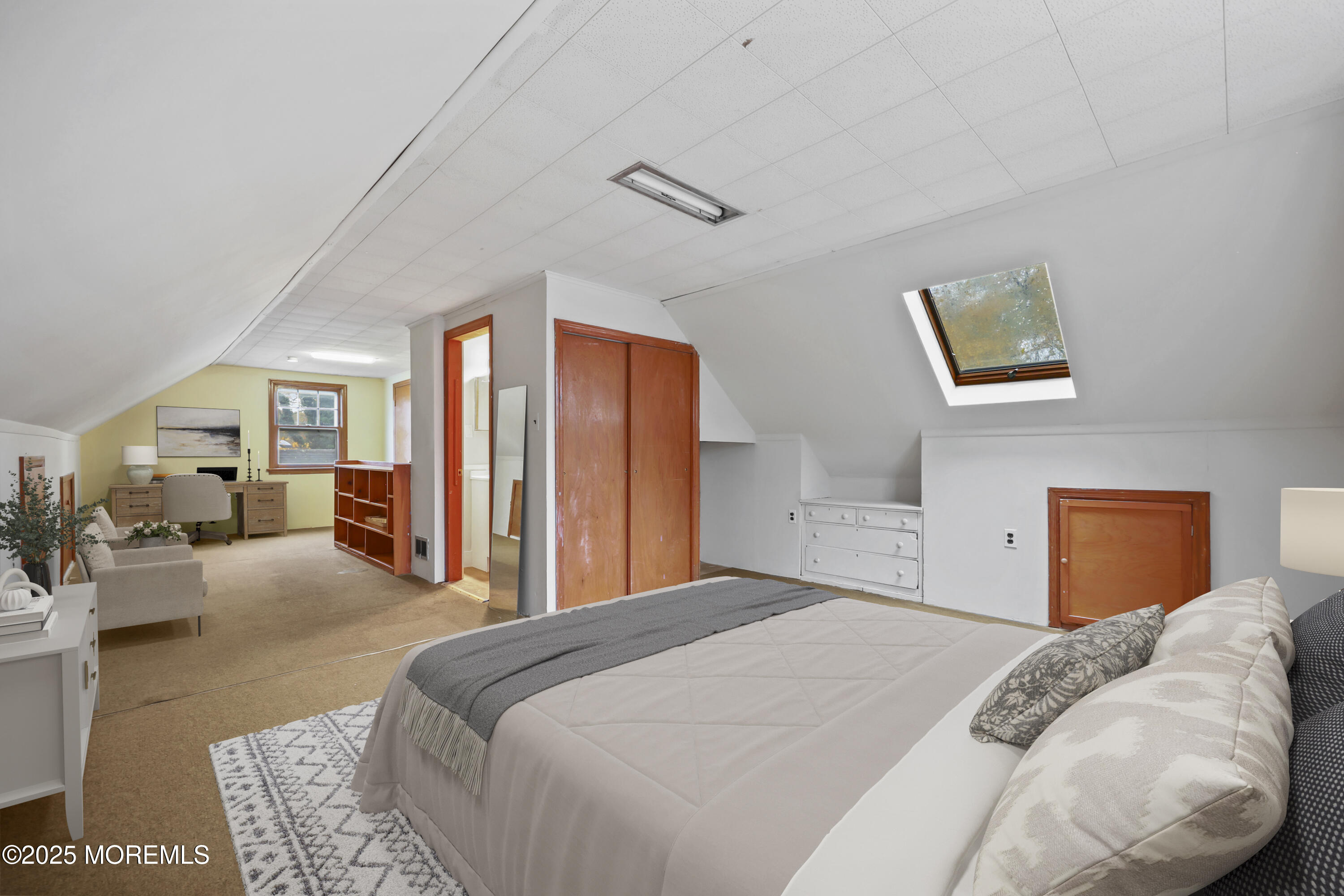 26 Edgewater Drive Matawan, NJ 07747 - Photo 22 of 23 a bedroom with a large bed and a couch