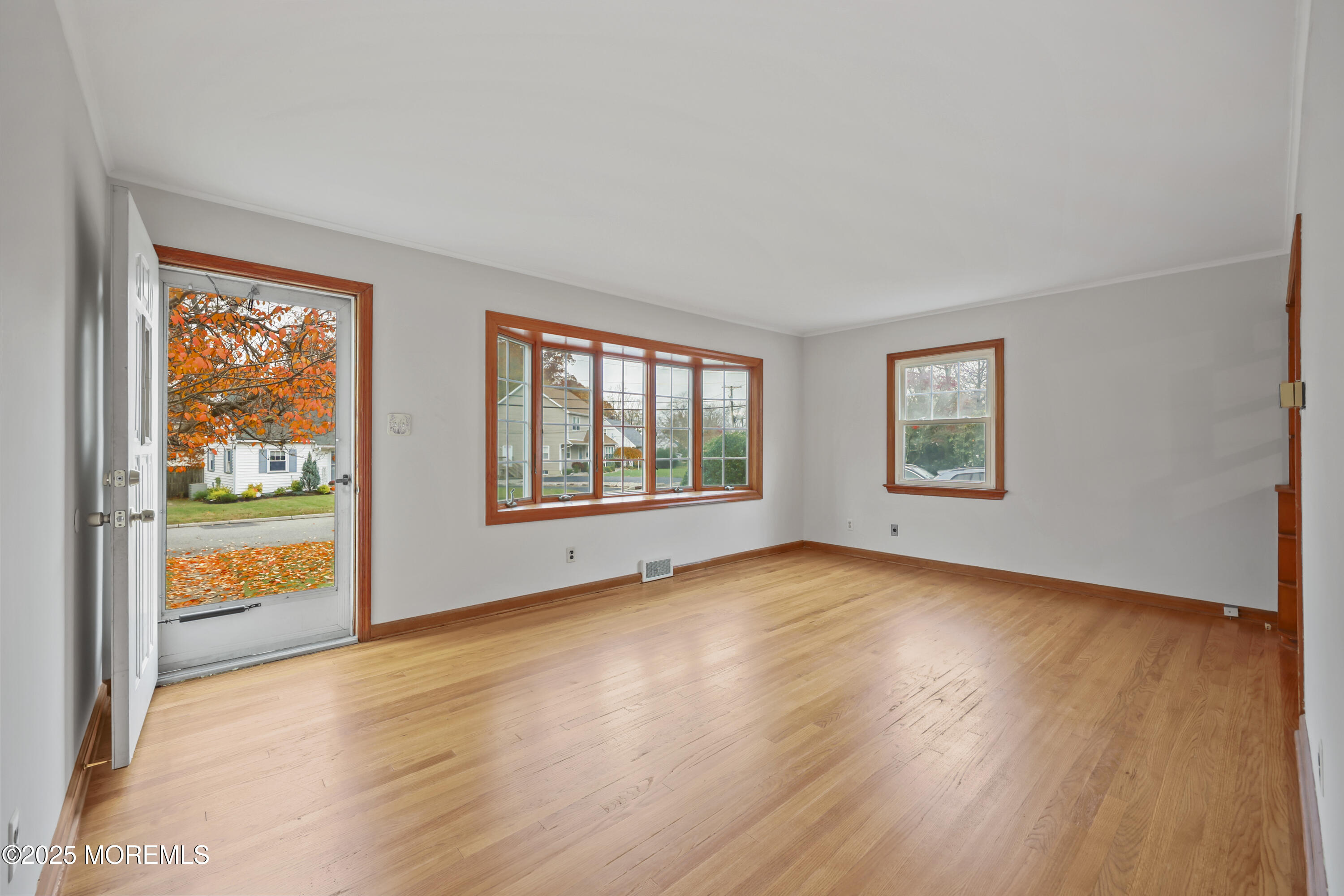 26 Edgewater Drive Matawan, NJ 07747 - Photo 8 of 23 an empty room with windows