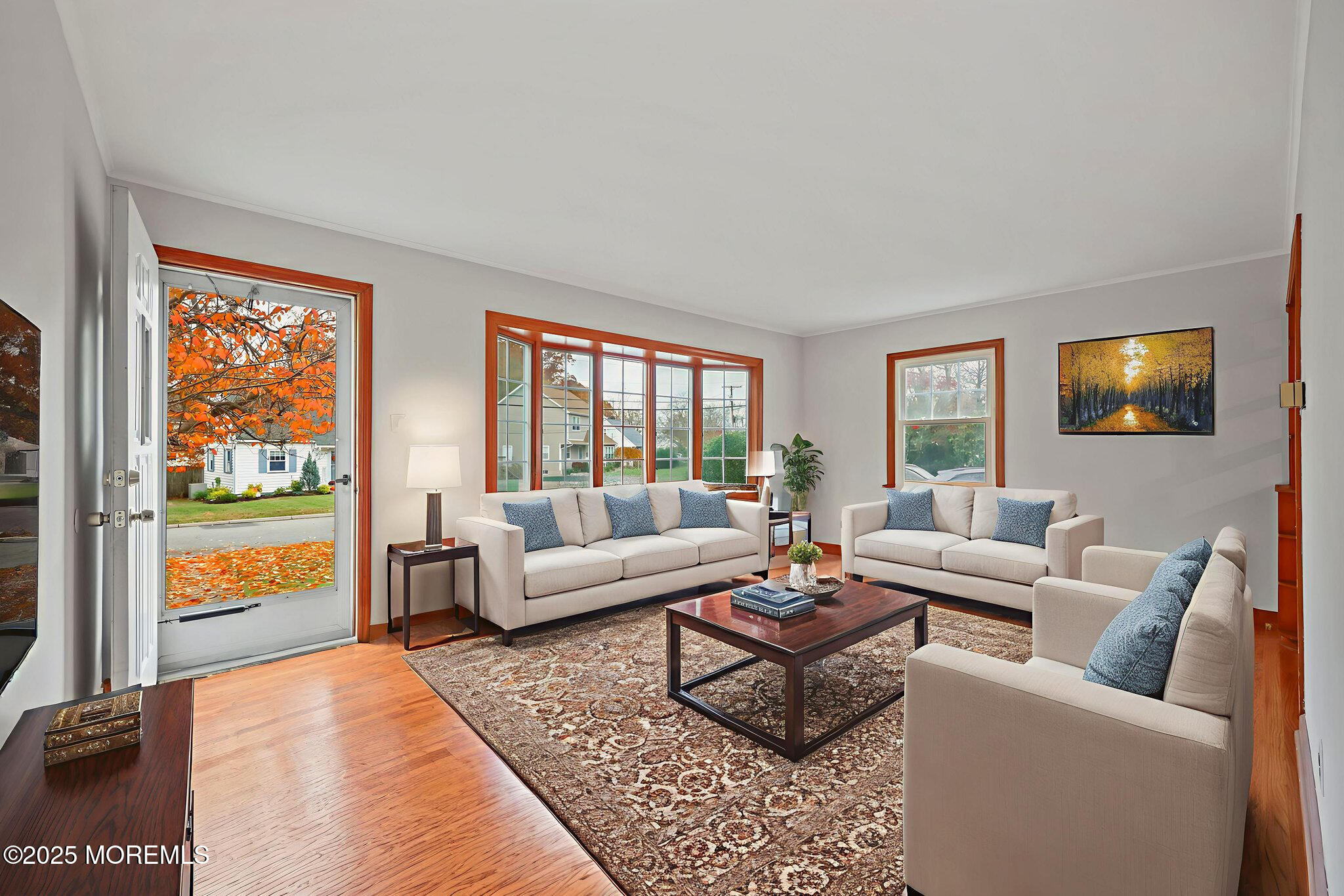 26 Edgewater Drive Matawan, NJ 07747 - Photo 9 of 23 a living room with furniture and a flat screen tv