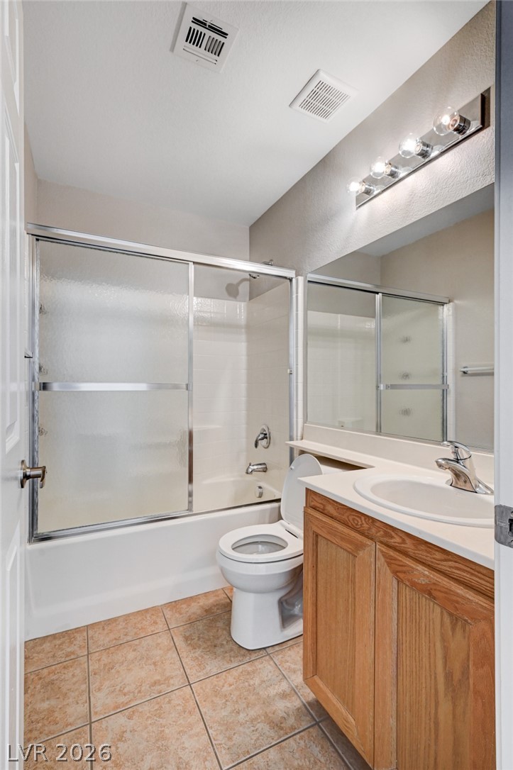 7259 Cestrum Road Las Vegas, NV 89113 - Photo 21 of 35 A well-lit bathroom provides both functionality and comfort with practical design elements.