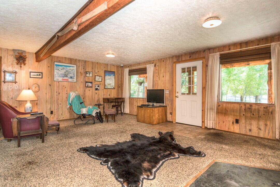 17026 Torrance Road Bend, OR 97707 - Photo 14 of 27 a bed room with furniture and a window