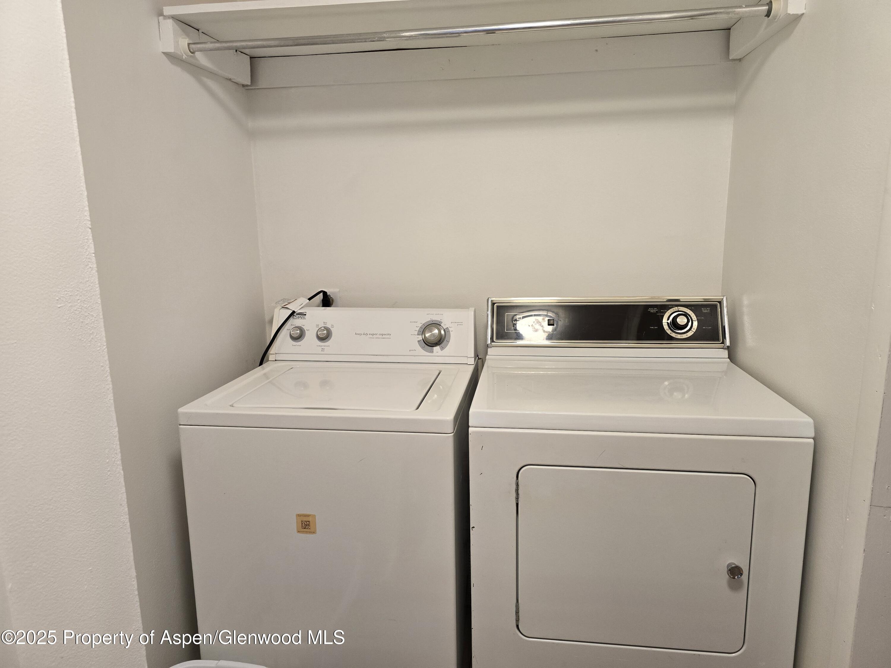 770 School Street Craig, CO 81625 - Photo 12 of 19 a utility room with dryer and washer