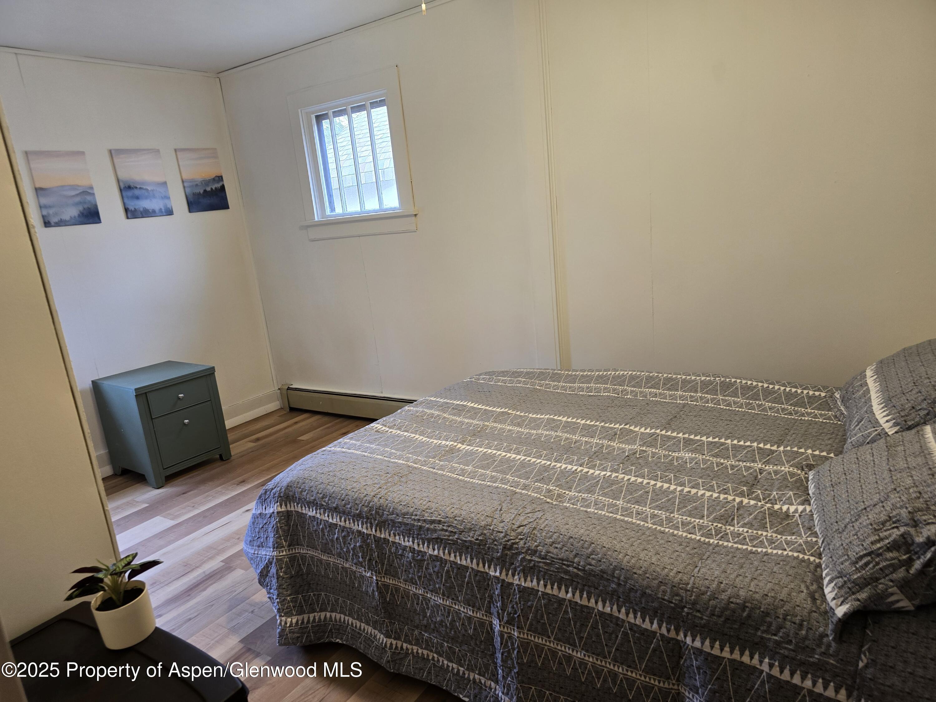 770 School Street Craig, CO 81625 - Photo 13 of 19 a bedroom with a bed and a window