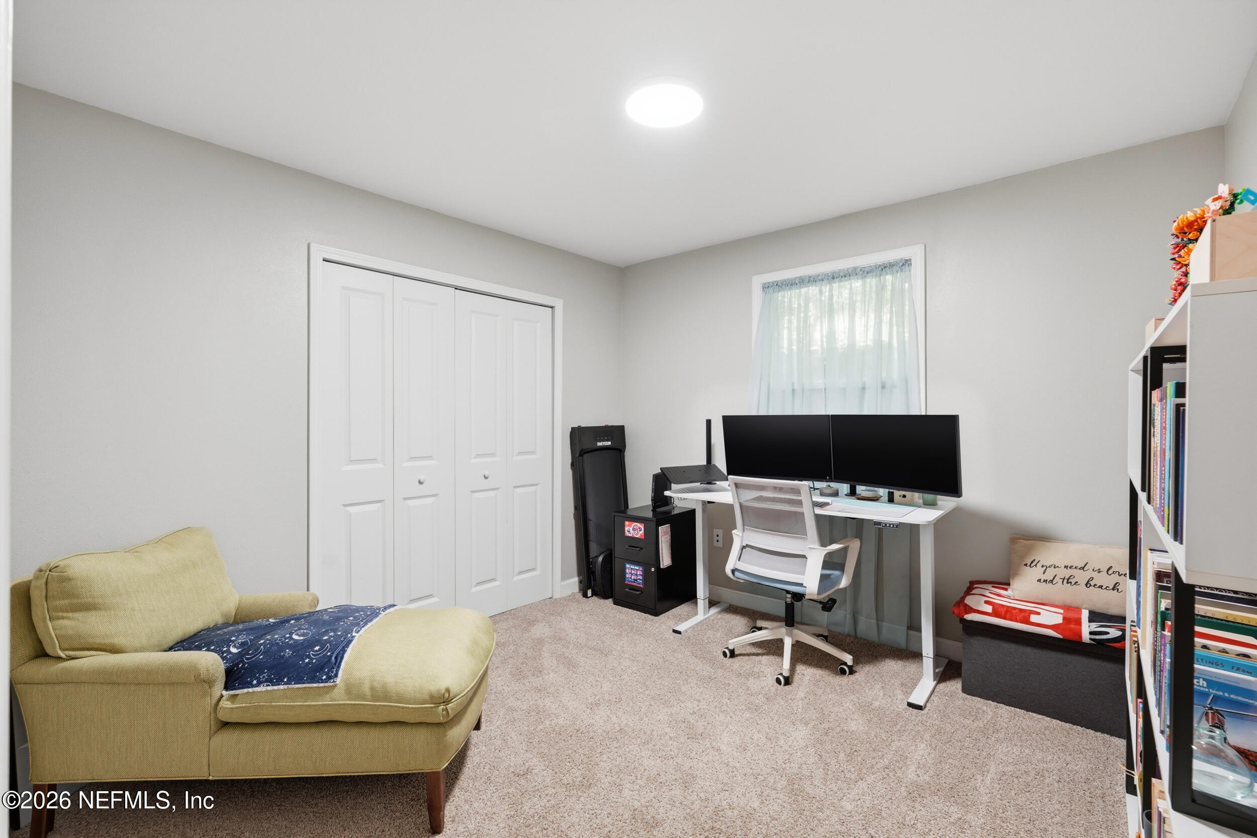 2032 Inwood Terrace Jacksonville, FL 32207 - Photo 19 of 27 a living room with furniture and a flat screen tv