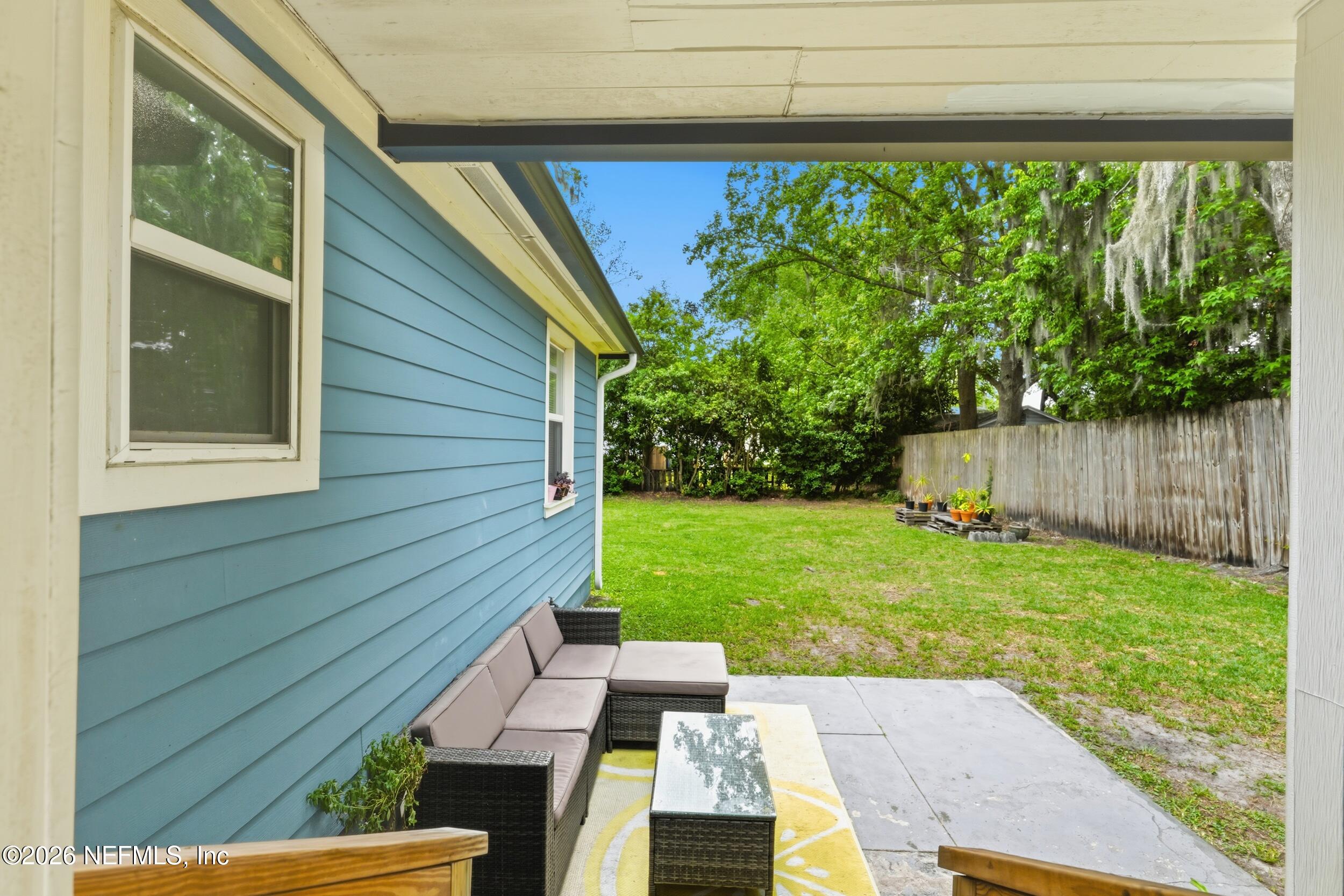 2032 Inwood Terrace Jacksonville, FL 32207 - Photo 21 of 27 a backyard of a house with lots of green space