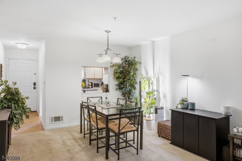 609 Mark Twain Way Mahwah, NJ 07430 - Photo 5 of 40 a view of a dining room with furniture