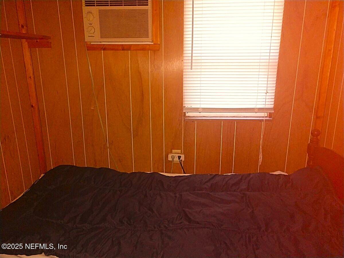 799 Roberts Aman Road Perry, FL 32347 - Photo 7 of 13 a view of an empty room with a window