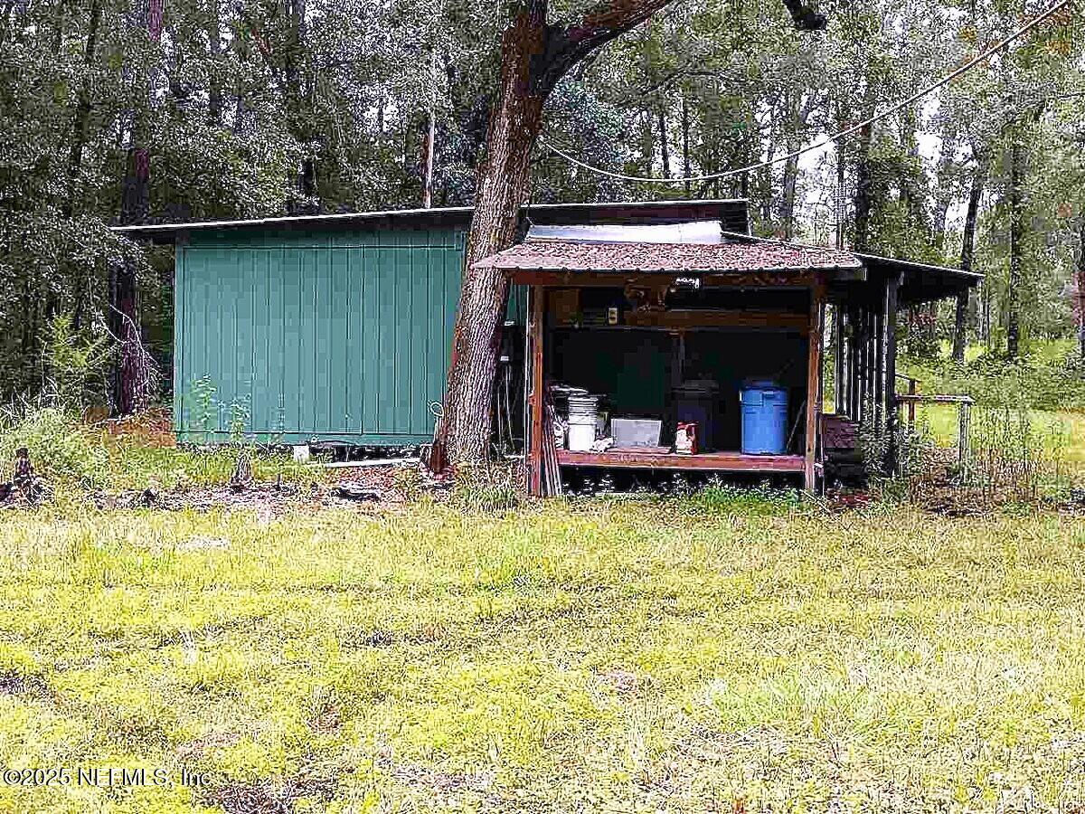 799 Roberts Aman Road Perry, FL 32347 - Photo 8 of 13 a view of outdoor space